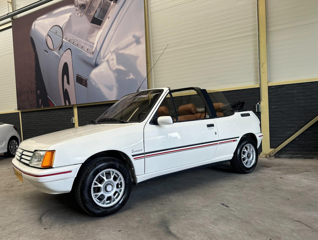 Peugeot 205 - 1.1i CJ Cabrio|NAP| APK 2027||VOITURE JOLIE - AutoWereld.nl