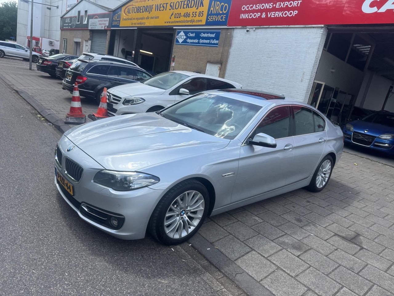 BMW 5-serie - 520i Last Minute Edition BJ 2014 OPEDAK LEER NAVI - AutoWereld.nl
