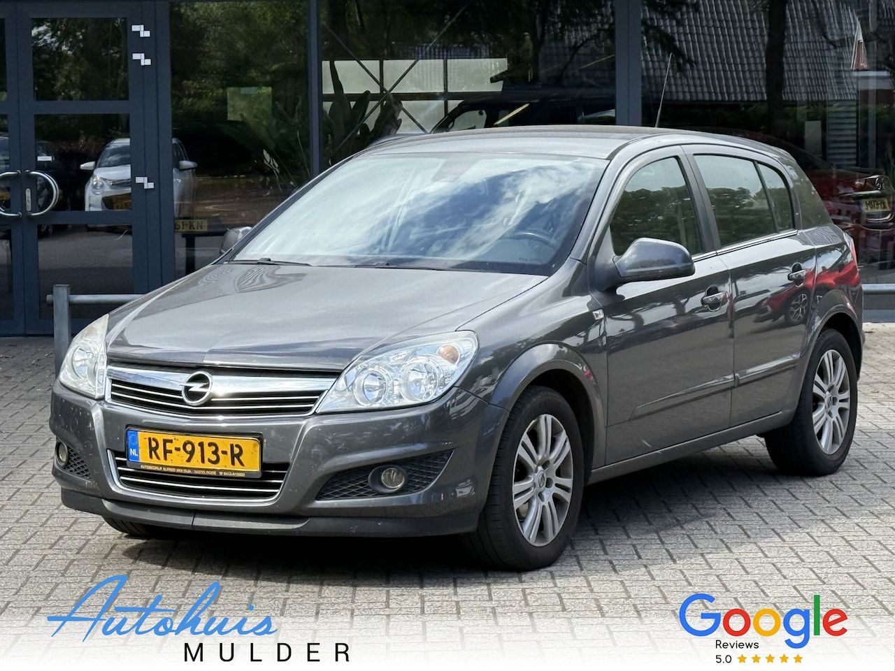 Opel Astra - 1.6 Cosmo/Clima/Cruise/Navigatie/Licht Metaal - AutoWereld.nl