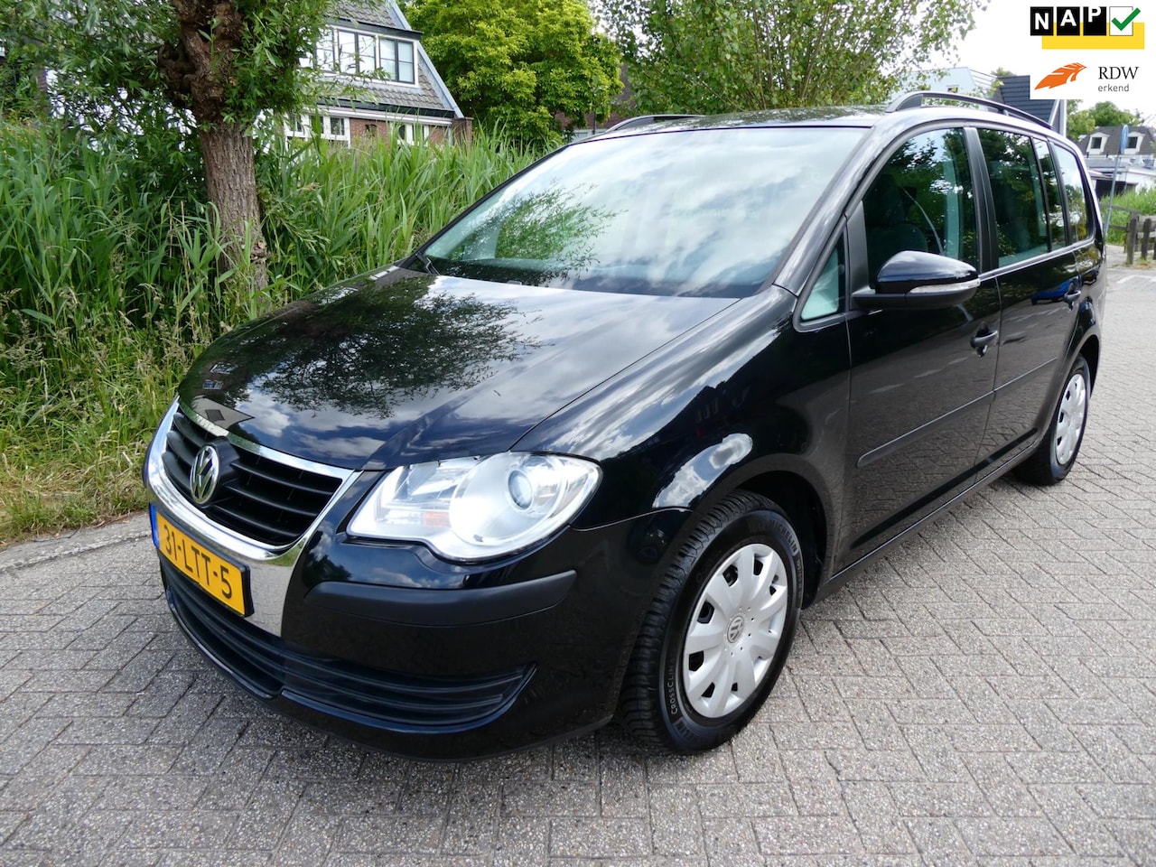 Volkswagen Touran - 1.4 TSI 140pk Airco Cruise Trekhaak 1500kg. Historie - AutoWereld.nl
