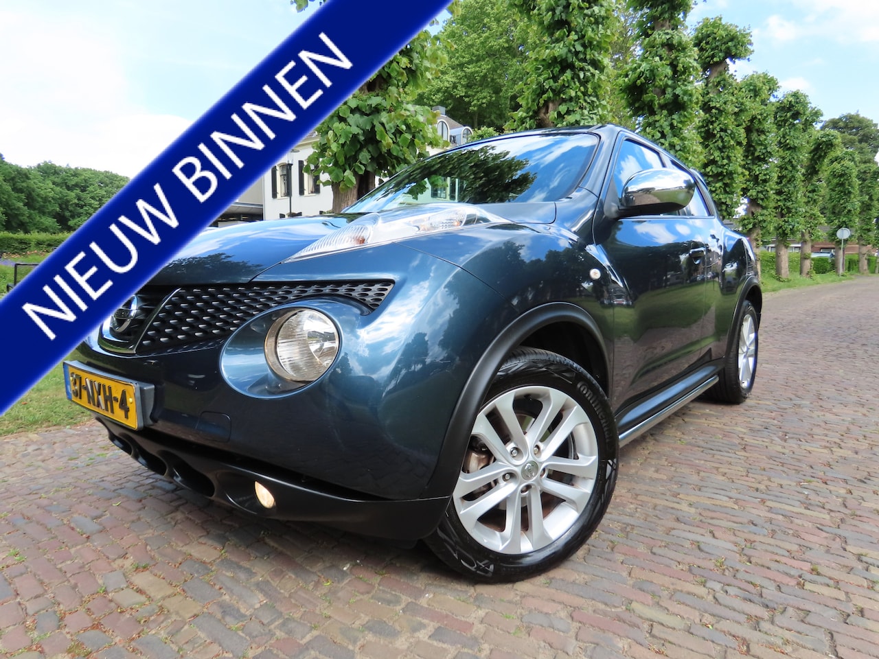 Nissan Juke - 1.6 Acenta Automaat Ecc Cruisecontrol Sidebar Lm Velgen Trekhaak - AutoWereld.nl