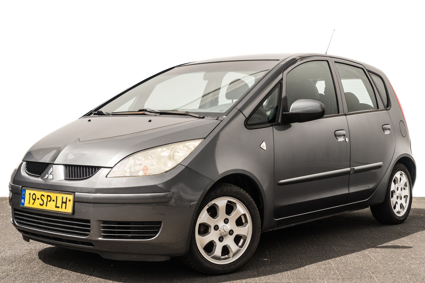 Mitsubishi Colt - 1.3 Invite I Airco I Org. Audio I Stuurbekr. I Trekhaak I LMV - AutoWereld.nl
