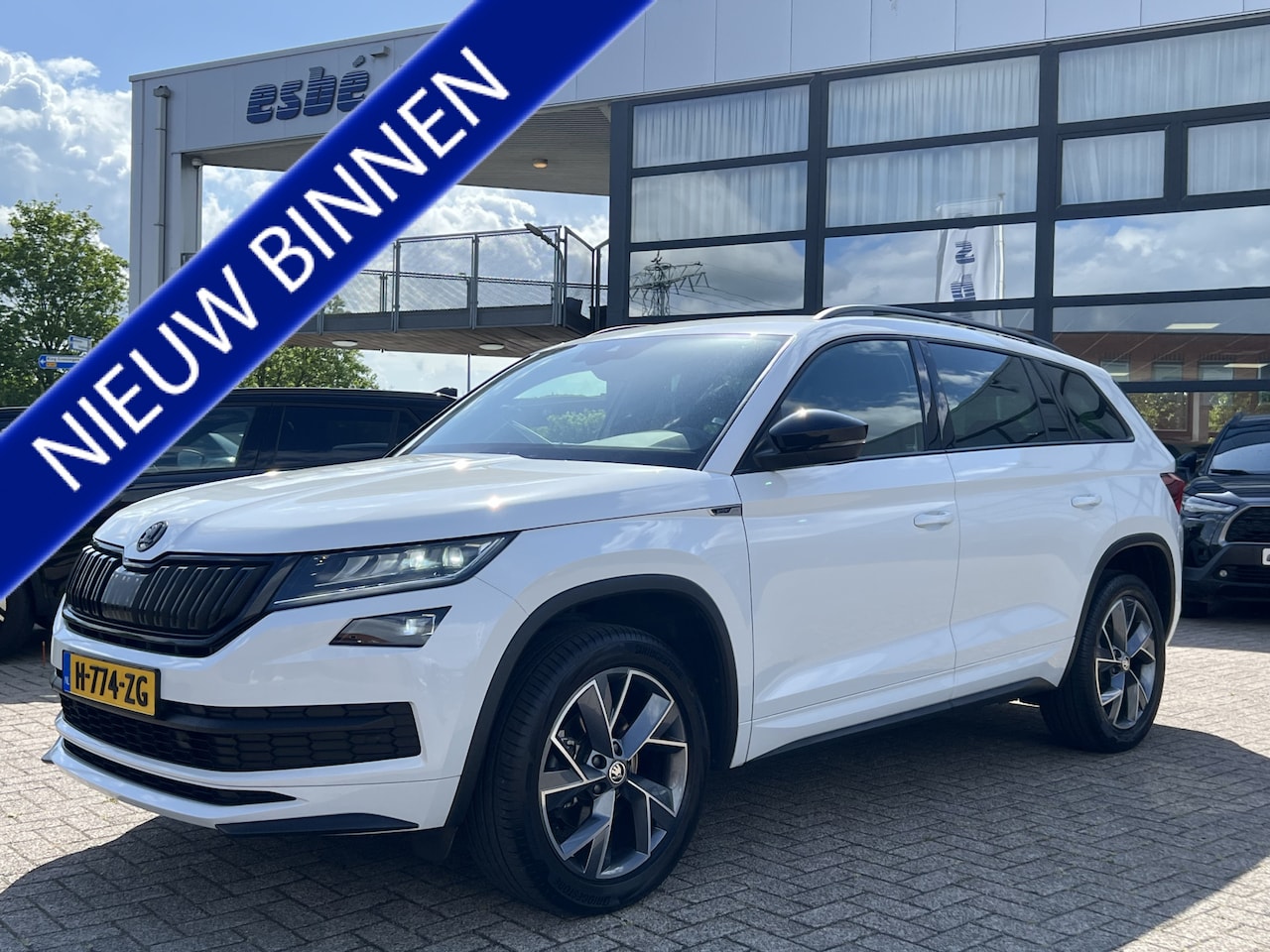 Skoda Kodiaq - 1.5 TSI DSG Sportline Business Navigatie 19 Inch Velgen Canton Audio DAB ACC Elek Stoel + - AutoWereld.nl