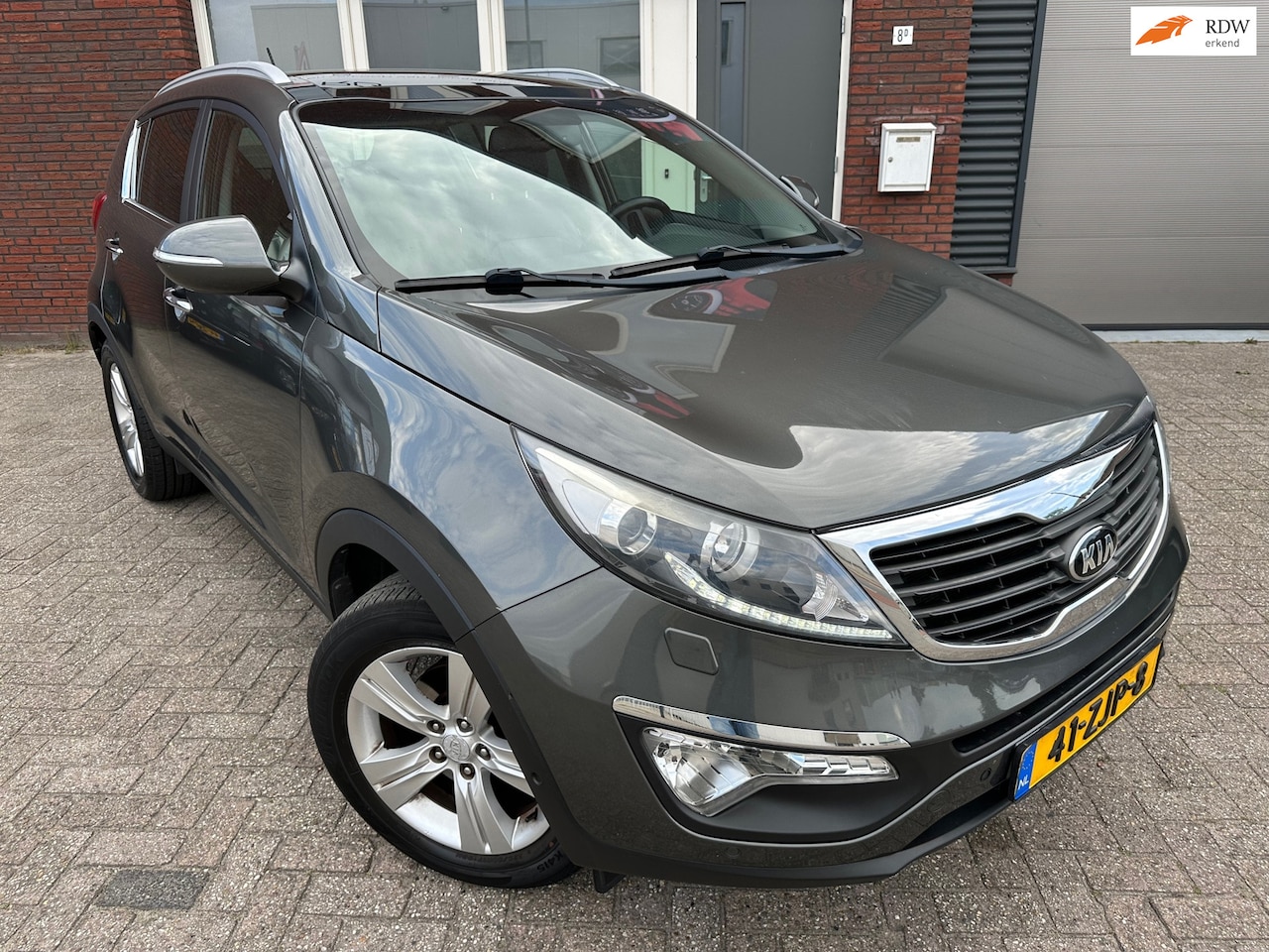 Kia Sportage - 1.6 GDI Super Pack / Pano / Leder / Camera / Navi - AutoWereld.nl