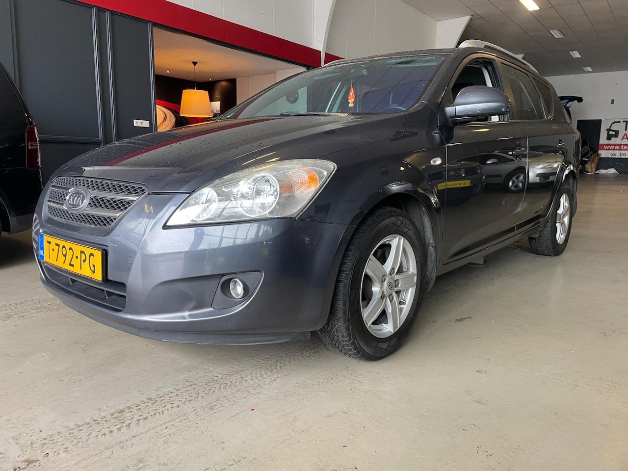 Kia Cee'd Sporty Wagon - 1.4 X-pect ISG navi camera zeer nette auto - AutoWereld.nl
