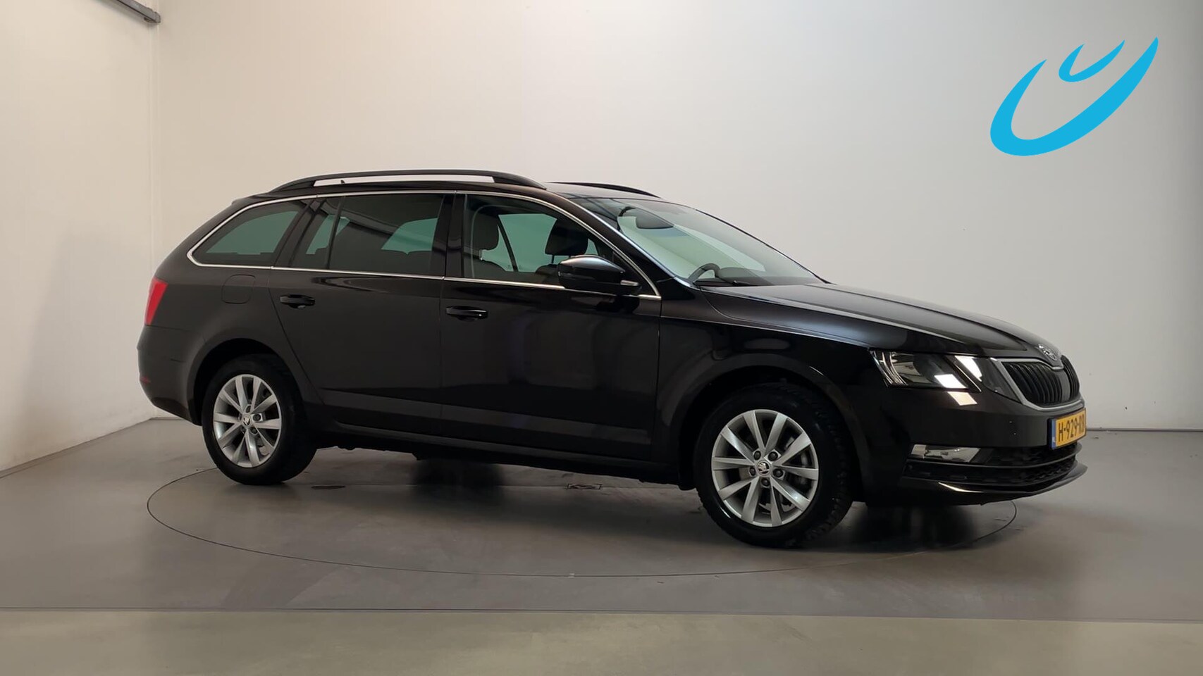 Skoda Octavia Combi - 1.5 TSI 150pk DSG Greentech Business Edition Leder-Stof Stoelverwarming Navigatie Climate - AutoWereld.nl