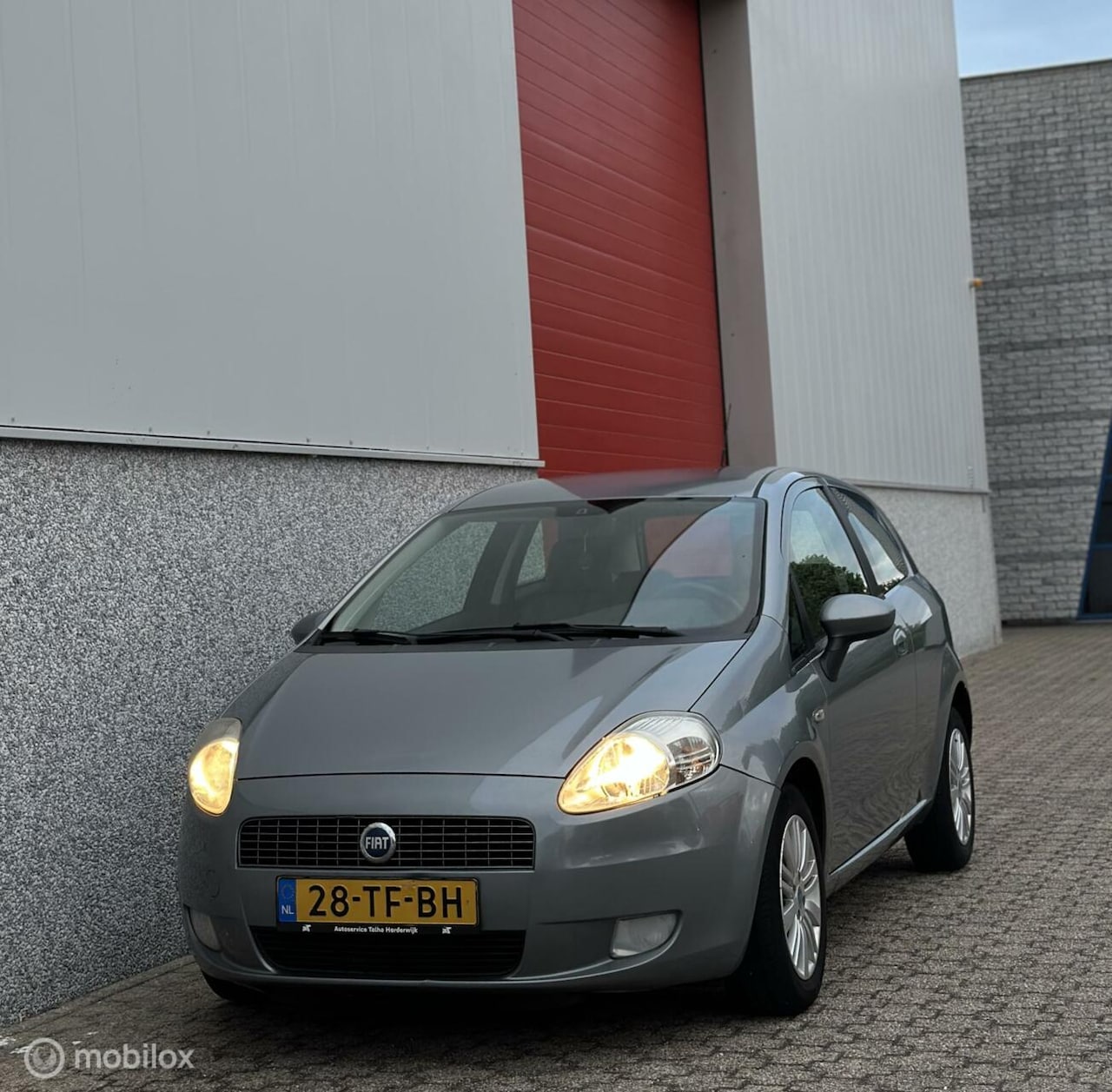 Fiat Grande Punto - 1.4 Edizione Blue & Me / Airco - AutoWereld.nl