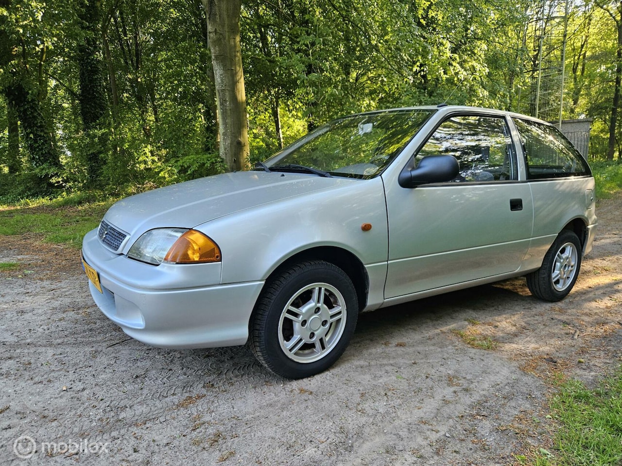 Suzuki Swift - 1.0 Eco nagenoeg nieuwstaat!!!! - AutoWereld.nl