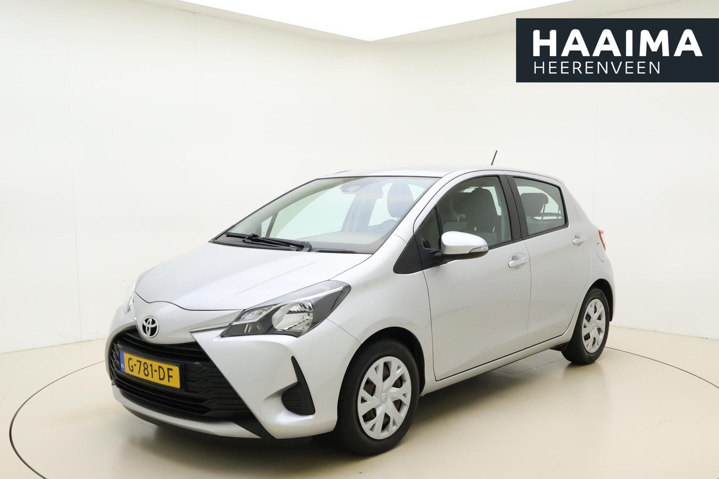 Toyota Yaris - 1.0 VVT-i Comfort | Airco | Weinig kilometers | Regensensor | Weinig kilometers | Metaalla - AutoWereld.nl