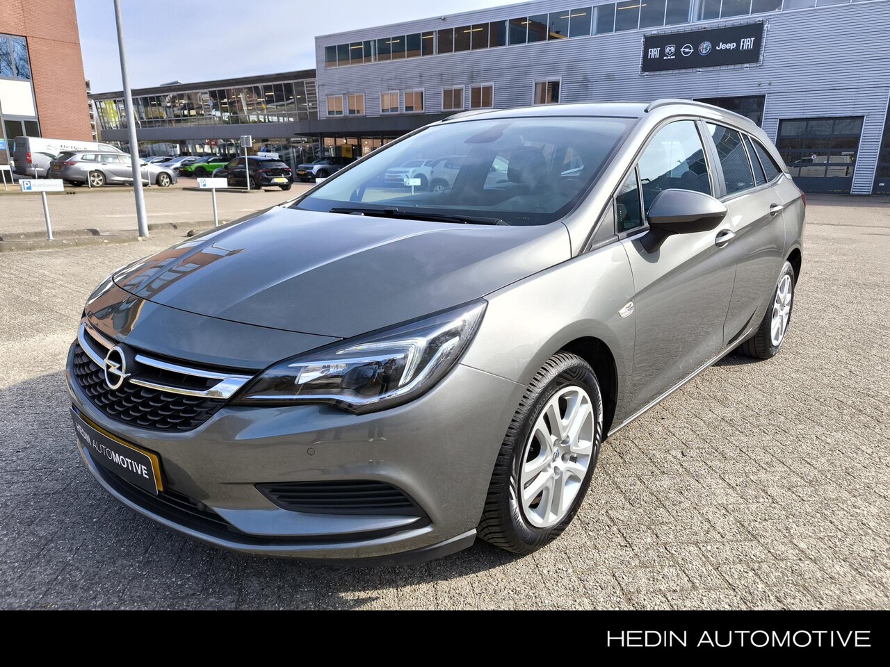 Opel Astra Sports Tourer - 1.0 Online Edition | Navigatie | Cruise Control | Apple Carplay/Android Auto | All Season - AutoWereld.nl