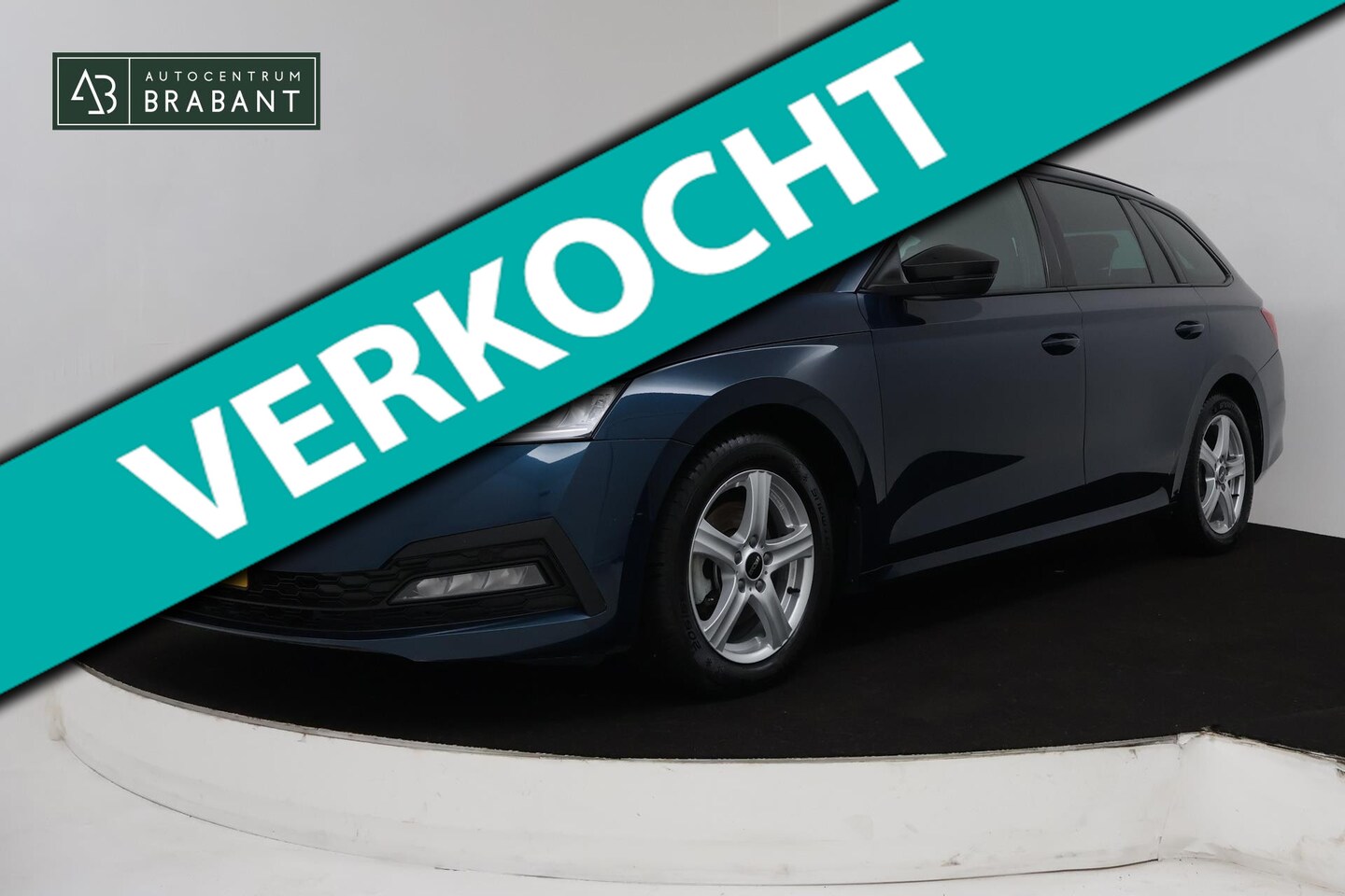 Skoda Octavia Combi - 1.0 e-TSI Sport Business (PARKEERSENSOREN, TREKHAAK, CRUISE, STUURVERWARMING, NAVIGATIE, S - AutoWereld.nl