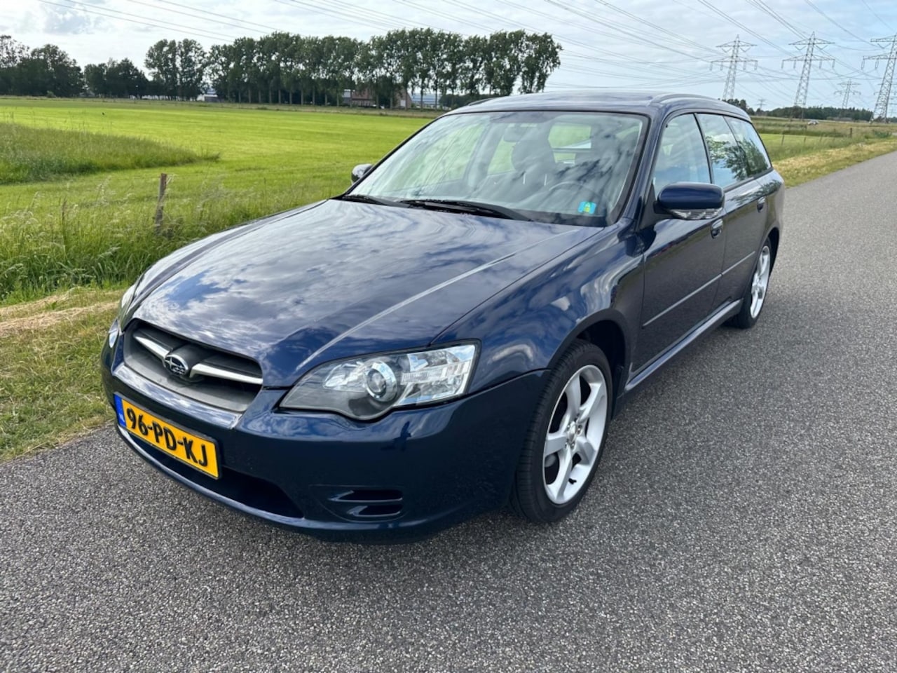 Subaru Legacy Touring Wagon - 2.5i AIRCO | AWD ! - AutoWereld.nl