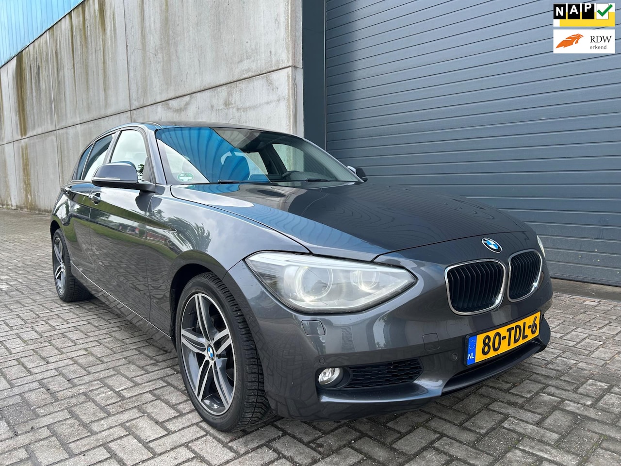 BMW 1-serie - 116i Business+ CLIMA NAVI PDC XENON - AutoWereld.nl