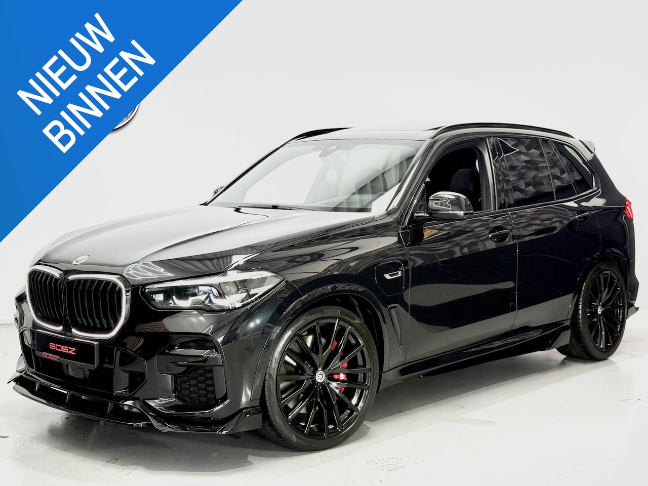 BMW X5 - 45e xDrive M-Sport HUD CRYSTAL SKY PANO AERO - AutoWereld.nl