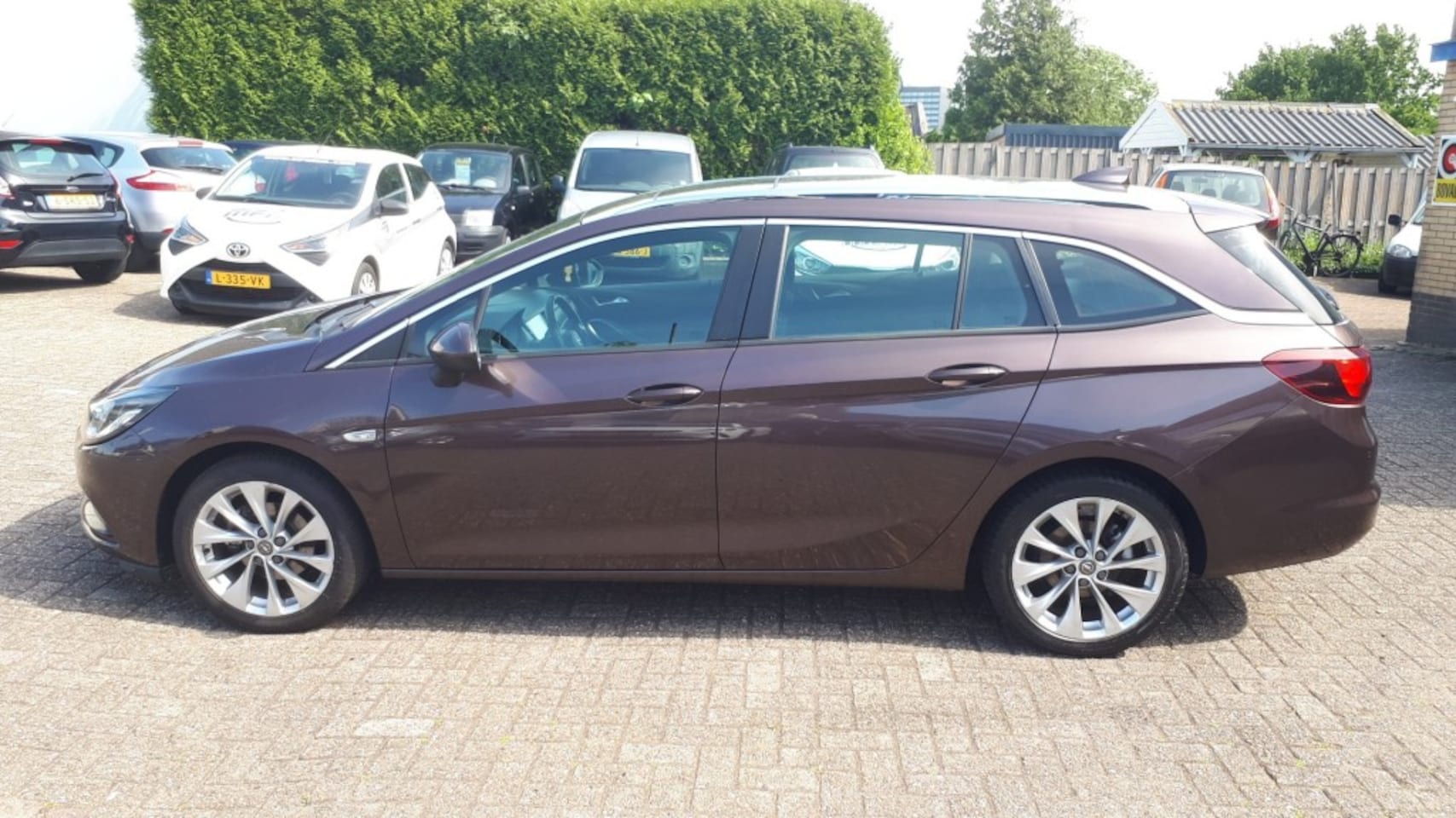 Opel Astra Sports Tourer - Sports Tourer 1.0 Business+ CLIMATE CONTR/ELEC OPEN DAK/PDC/ELEC RAMEN V+A/CRUISE/TREKHAAK