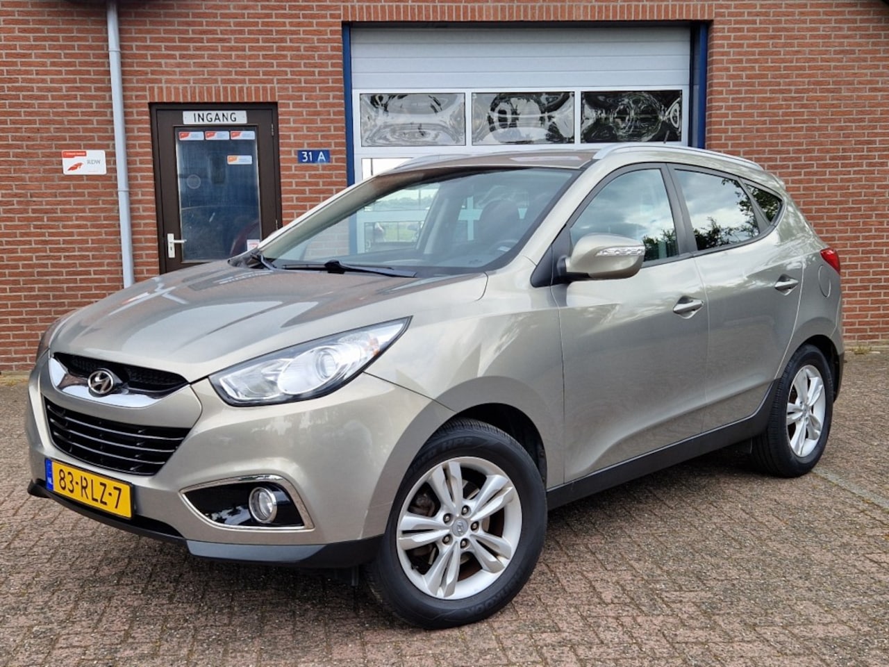 Hyundai ix35 - 2.0i Business Edition Navi NL-auto Clima Trekhaak afn. - AutoWereld.nl