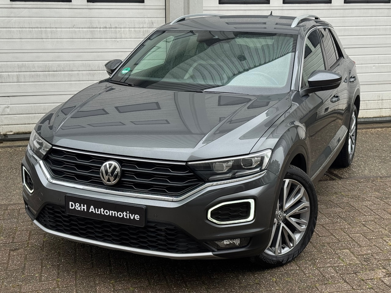 Volkswagen T-Roc - 2.0 TSI 4Motion Sport acc/led/xenon/aut/carplay/navi/front-lane/selectmodus - AutoWereld.nl