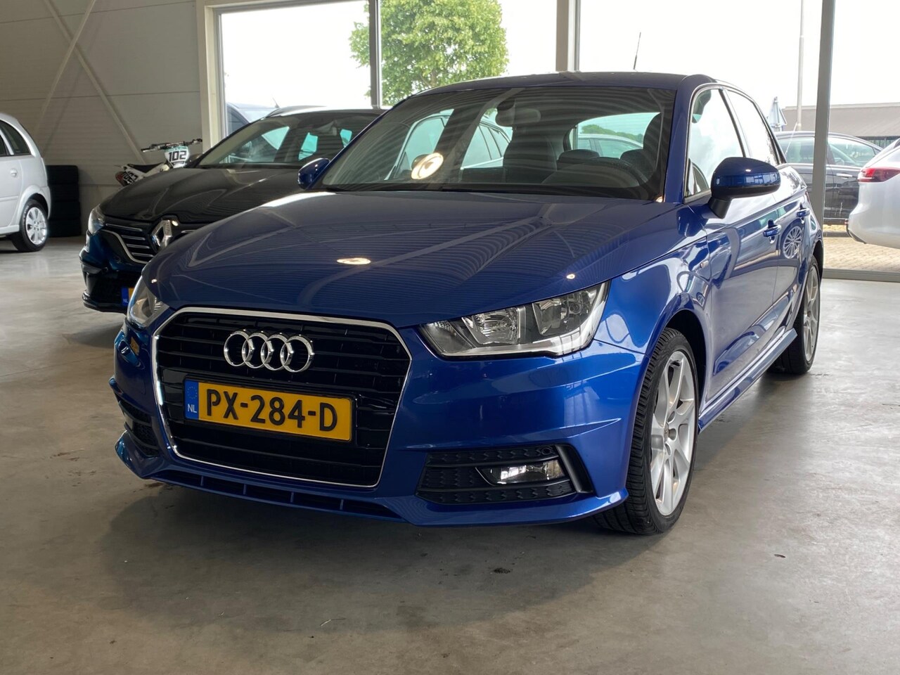 Audi A1 Sportback - 1.0 TFSI S-line - AutoWereld.nl