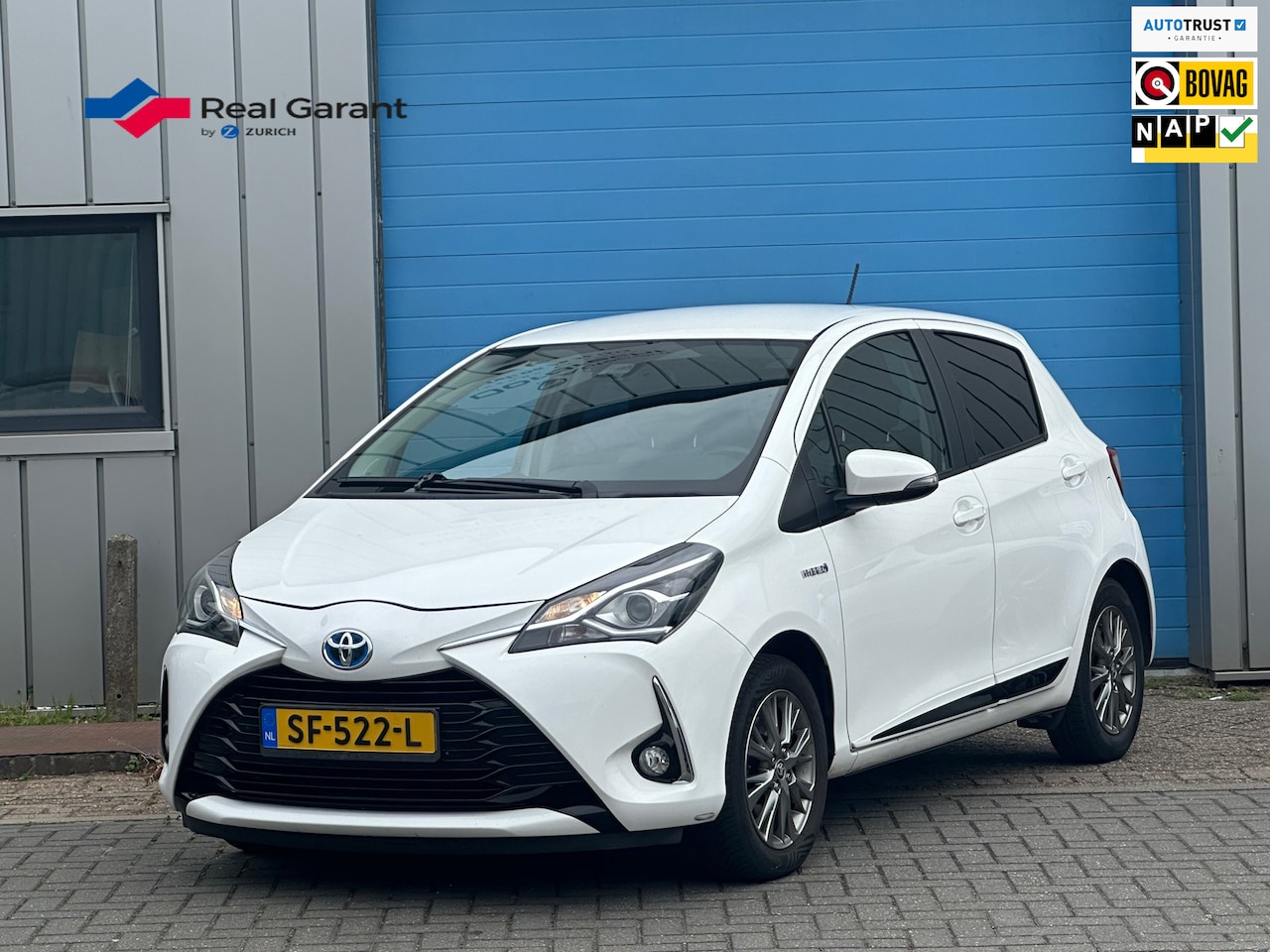 Toyota Yaris - 1.5 Hybrid Design Red AUT CAMERA PDC EERSTE EIG - AutoWereld.nl