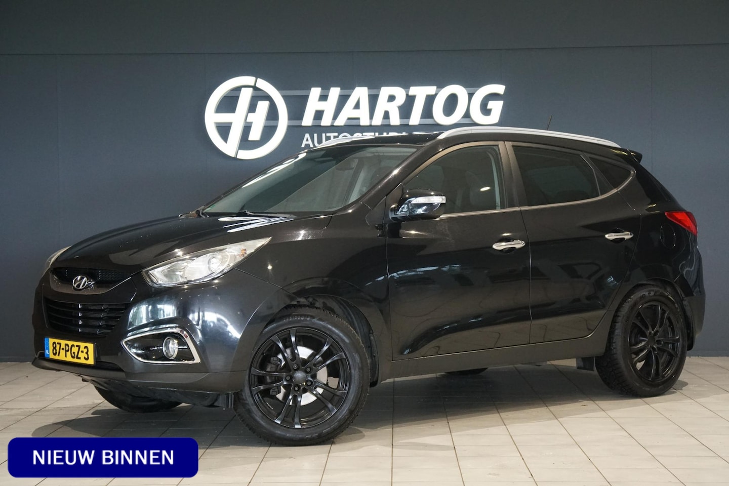 Hyundai ix35 - 2.0i Business Edition AUT. + CAMERA / TREKHAAK - AutoWereld.nl