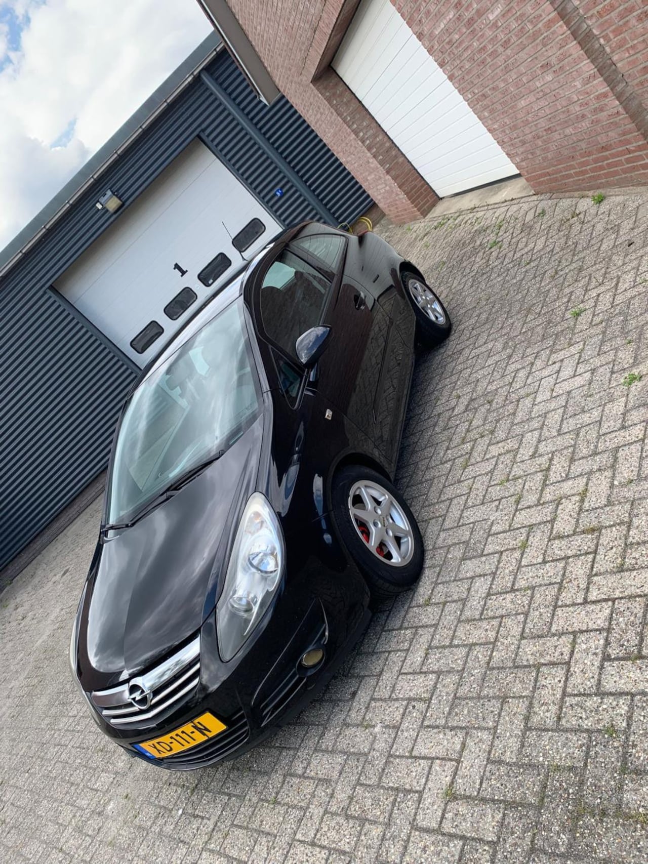 Opel Corsa - 1.4-16V Enjoy 1.4-16V Enjoy - AutoWereld.nl