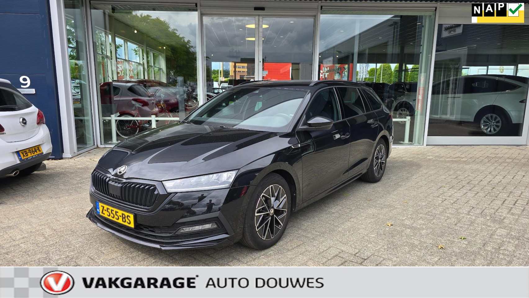 Skoda Octavia Combi - 1.5 e-TSI Sportline Business | NAP | Automaat | 1e eigenaar | Stoelverw. | Carplay | Digit - AutoWereld.nl