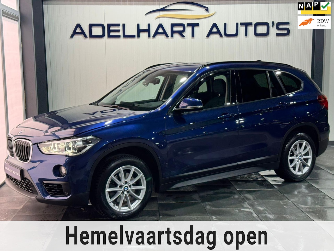 BMW X1 - SDrive18i Executive Sport / Automaat / HUD / Navigatie full map / Elektrische stoelen / Me - AutoWereld.nl