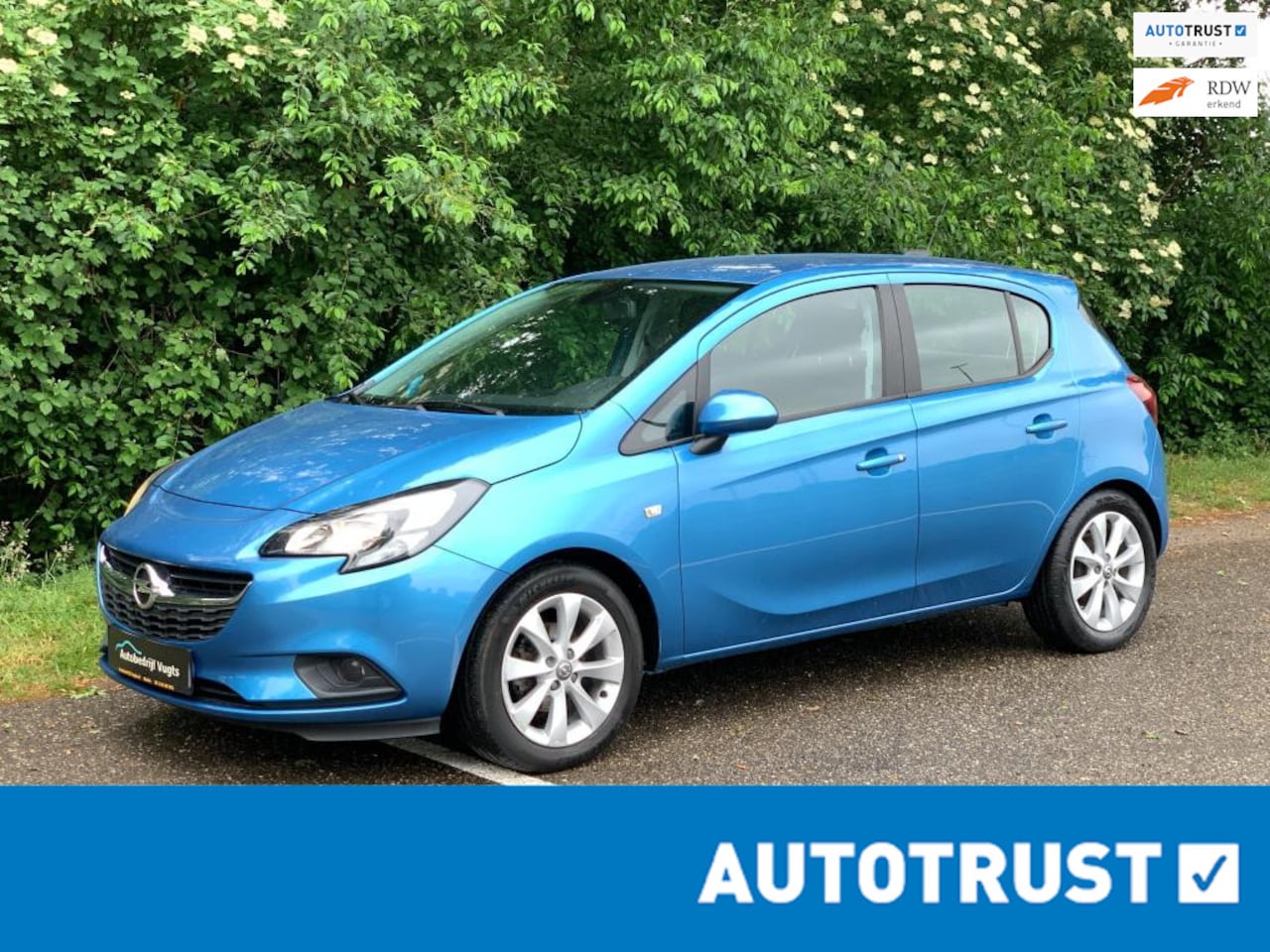 Opel Corsa - 1.4 Favourite *Navi*Cruise*PDC*Isofix* - AutoWereld.nl