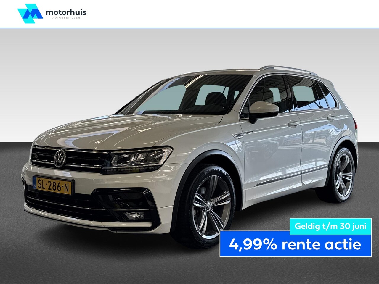 Volkswagen Tiguan - 1.4 TSI 125PK HIGHLINE EXECUTIVE R-LINE NAVI TEL PDC LED CRUISE NAP - AutoWereld.nl