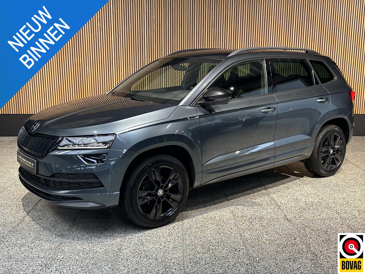 Skoda Karoq - 1.5 TSI ACT Sportline Business 1.5 TSI ACT Sportline Business - AutoWereld.nl