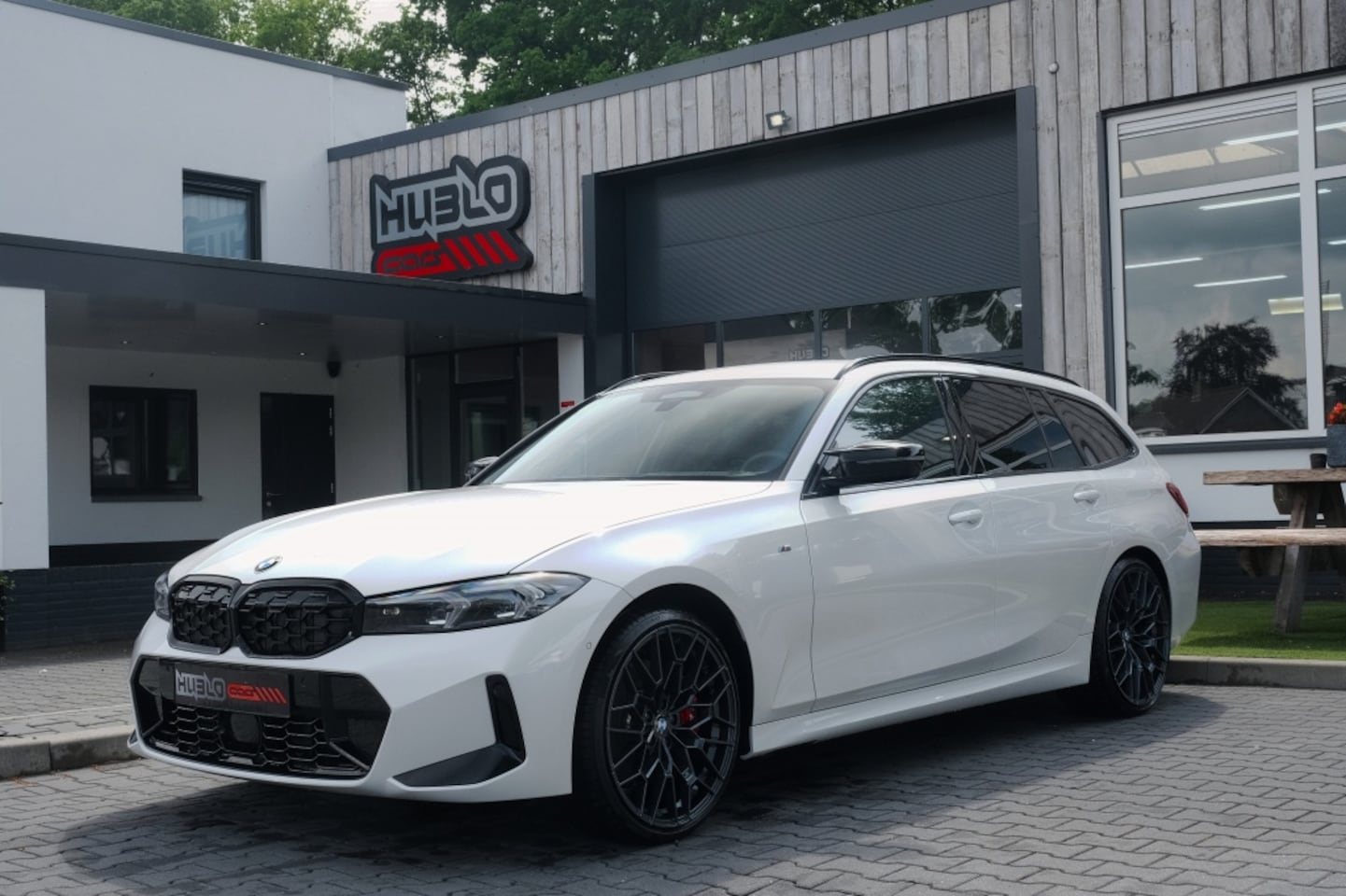 BMW 3-serie Touring - M340i xDrive Lederen kuipstoelen, Carbon, Head-Up. - AutoWereld.nl