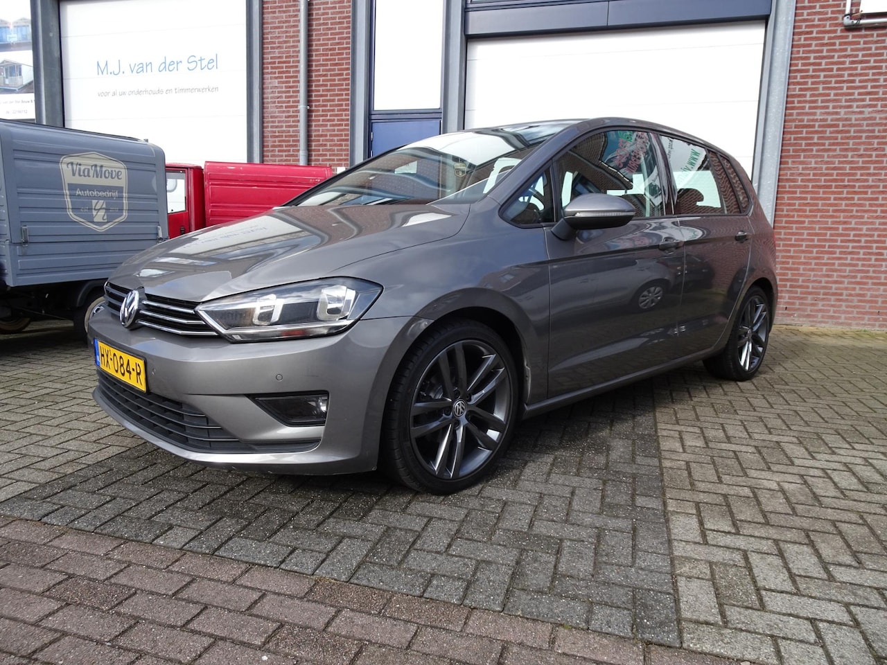 Volkswagen Golf Sportsvan - 1.0 TSI Trendline Navi|Airco|Carplay|PDC V+A - AutoWereld.nl