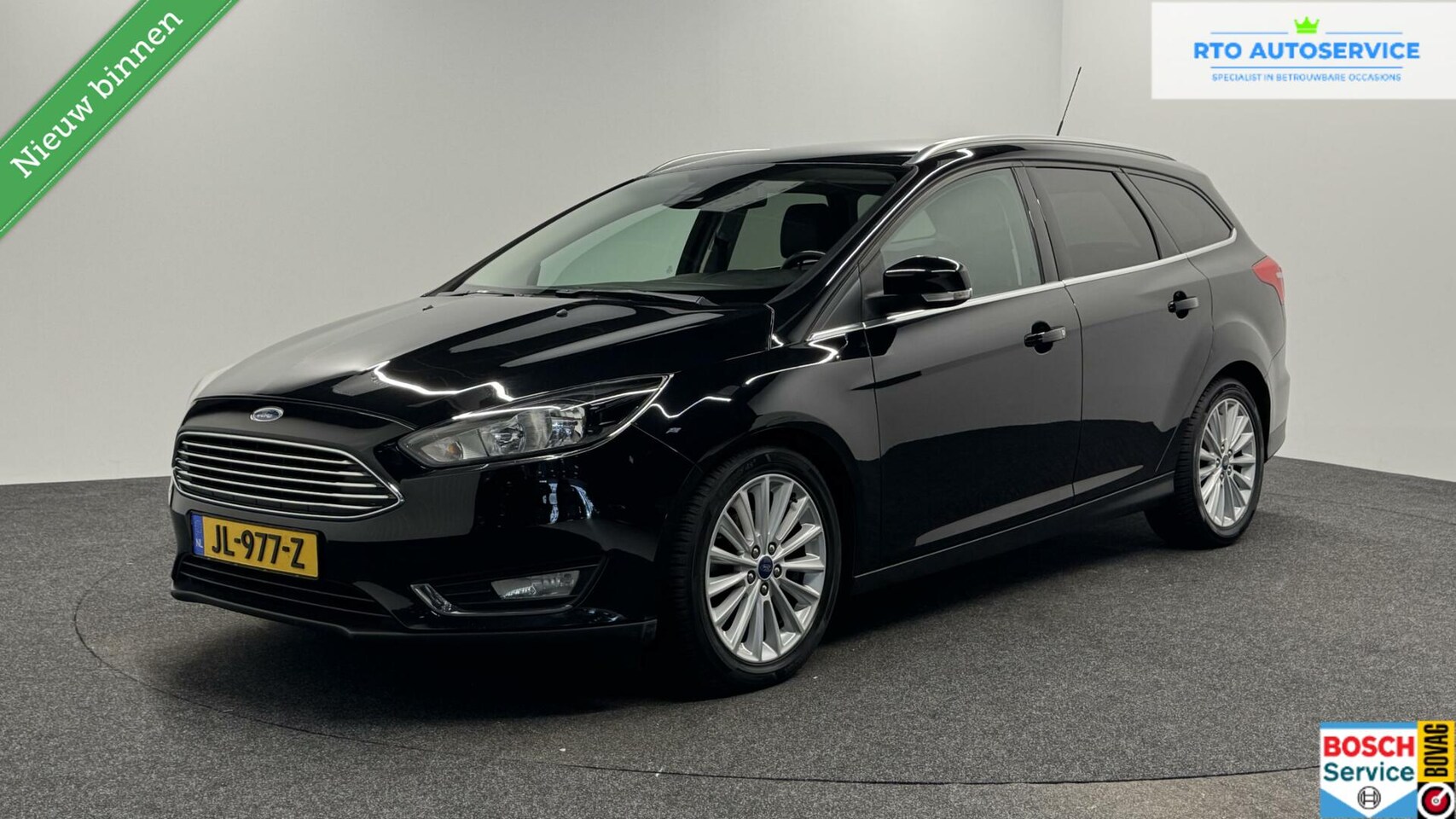 Ford Focus Wagon - 1.0 Titanium Edition CRUISE LM NAVI TREKHAAK - AutoWereld.nl
