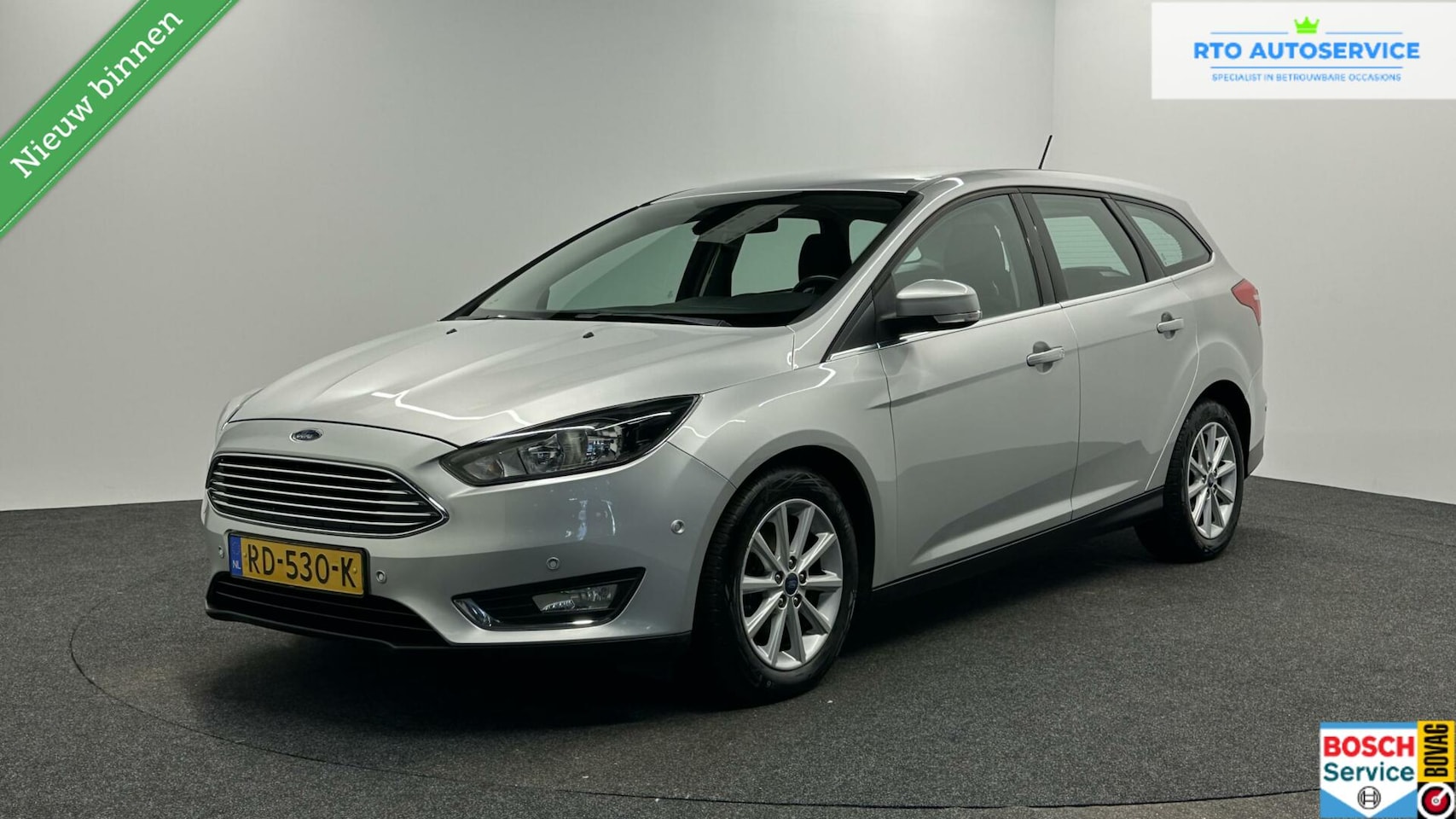Ford Focus Wagon - 1.0 Titanium Edition CRUISE LM NAVI TREKHAAK - AutoWereld.nl