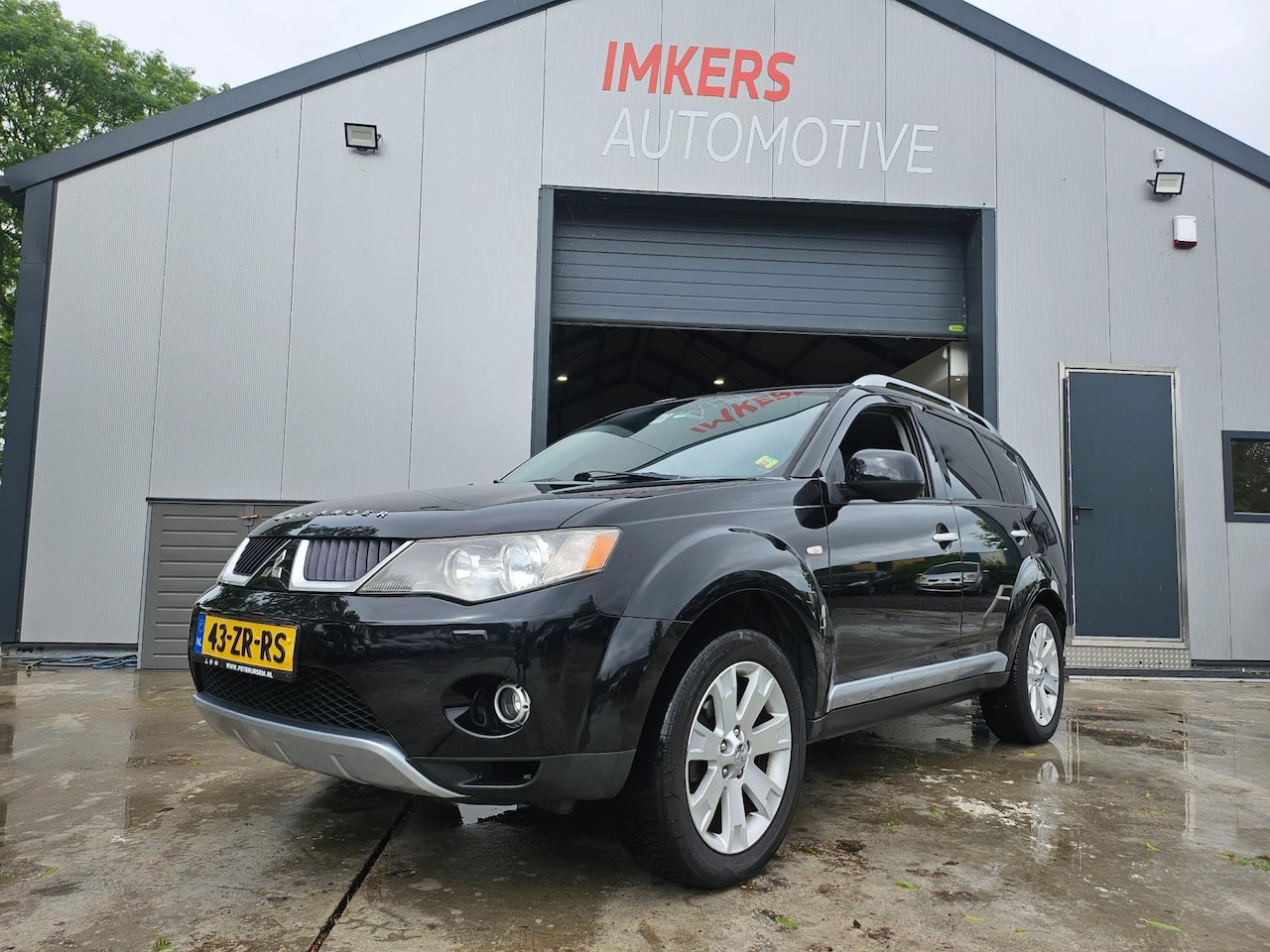Mitsubishi Outlander - 2.4 Instyle 4X4 AUT DAK LEER KEYLESS - AutoWereld.nl