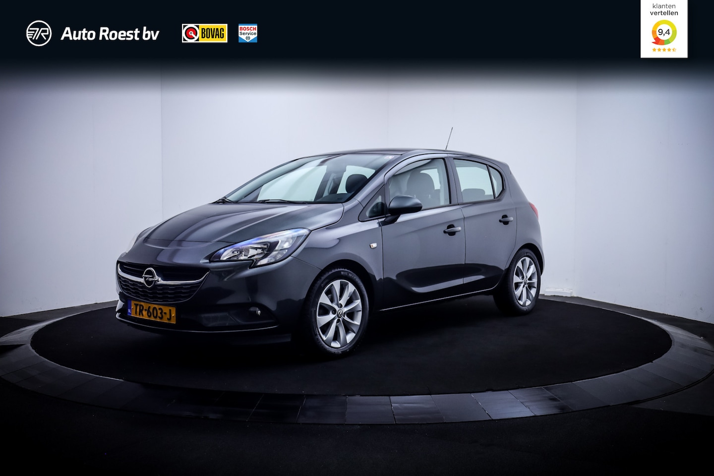 Opel Corsa - 1.4i Favourite CARPLAY | AIRCO | NAVI | DAB | CRUISE | PDC | LMV - AutoWereld.nl