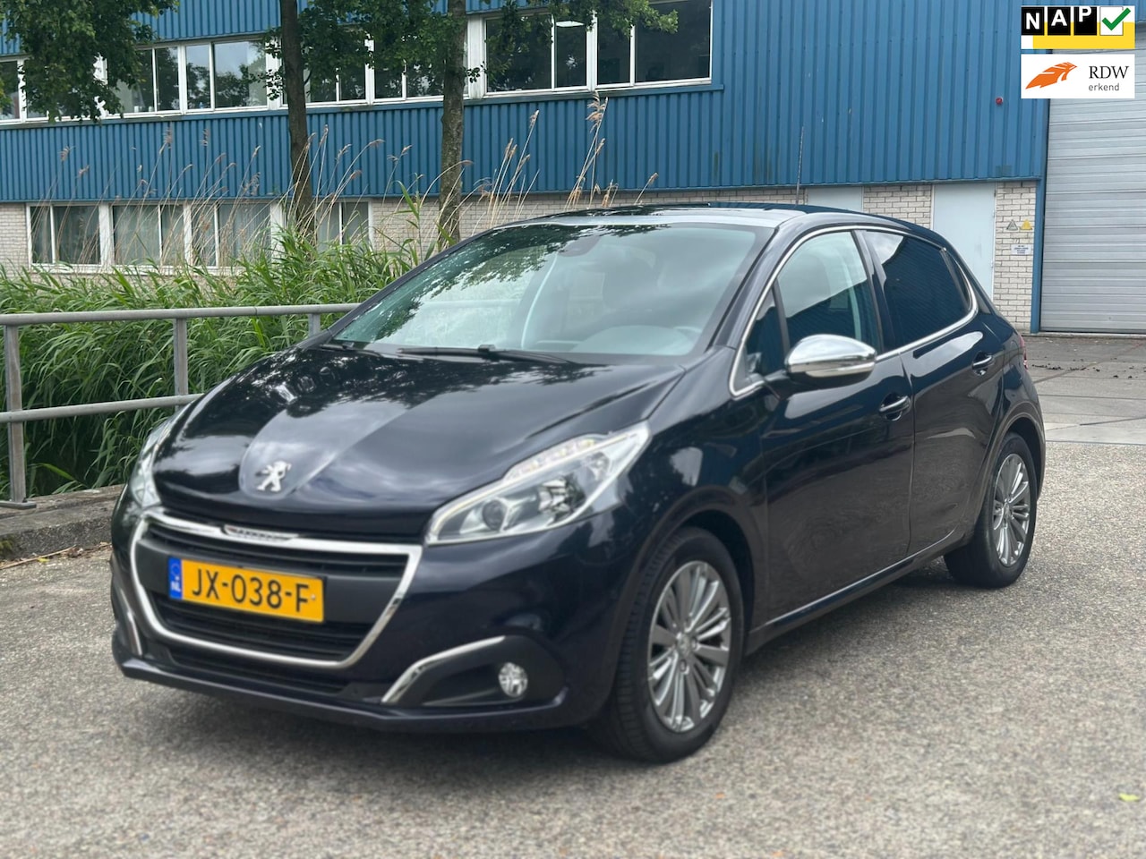 Peugeot 208 - 1.2 PureTech Roland Garros Automaat! Pano! 87.000 KM NAP! Navi! - AutoWereld.nl