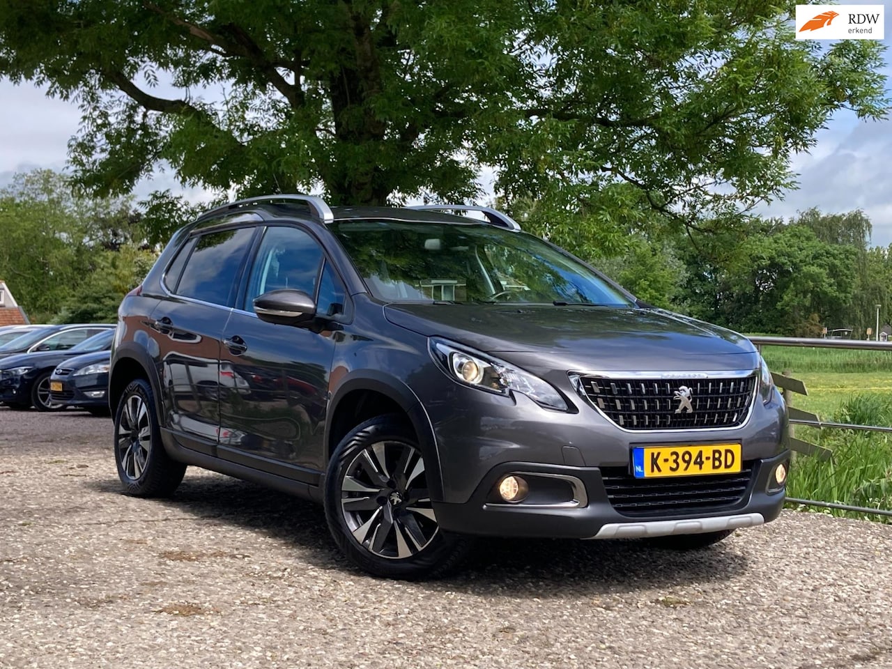 Peugeot 2008 - 1.2 PureTech Signature | Automaat + Leder + Clima + Navi + Cruise nu €9.975,-!! - AutoWereld.nl