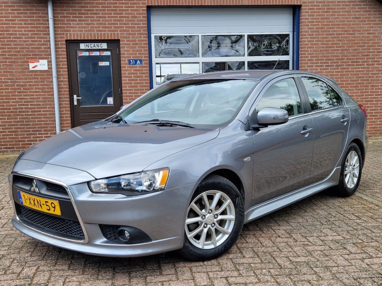 Mitsubishi Lancer Sportback - Sportback 1.6 Limited Edition NL-auto Climate Cruise Stoelverw Dealer OH - AutoWereld.nl