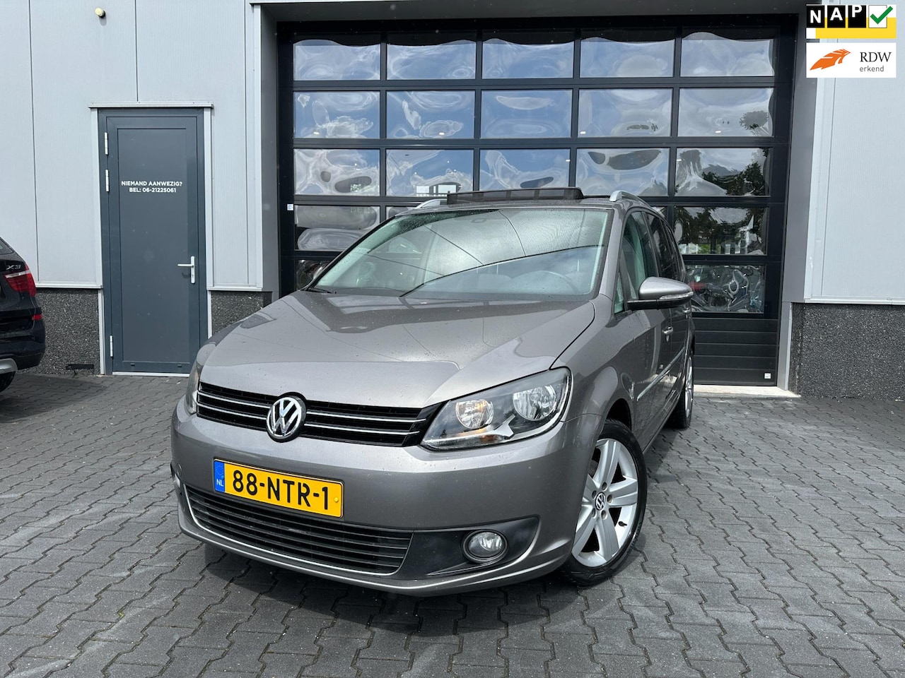 Volkswagen Touran - 1.4 TSI Highline 7-persoons automaat - AutoWereld.nl