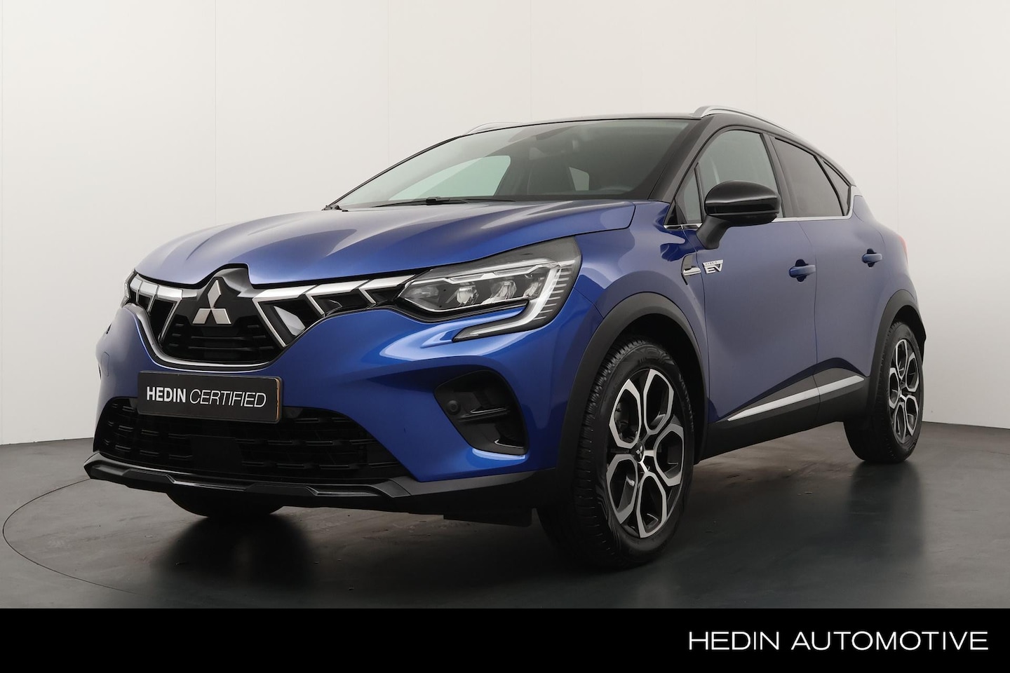 Renault Captur - Mitsubishi ASX 1.6 143pk HEV AT First Edition | Trekhaak | Navigatie | Camera | Adaptieve - AutoWereld.nl