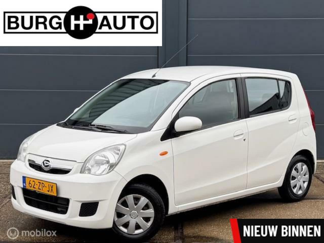 Daihatsu Cuore - 1.0 Premium 5 deurs - AIRCO - EL. RAMEN - CPV -STUURBEKRACHTIGING - RADIO/CD - VERSTELBARE - AutoWereld.nl
