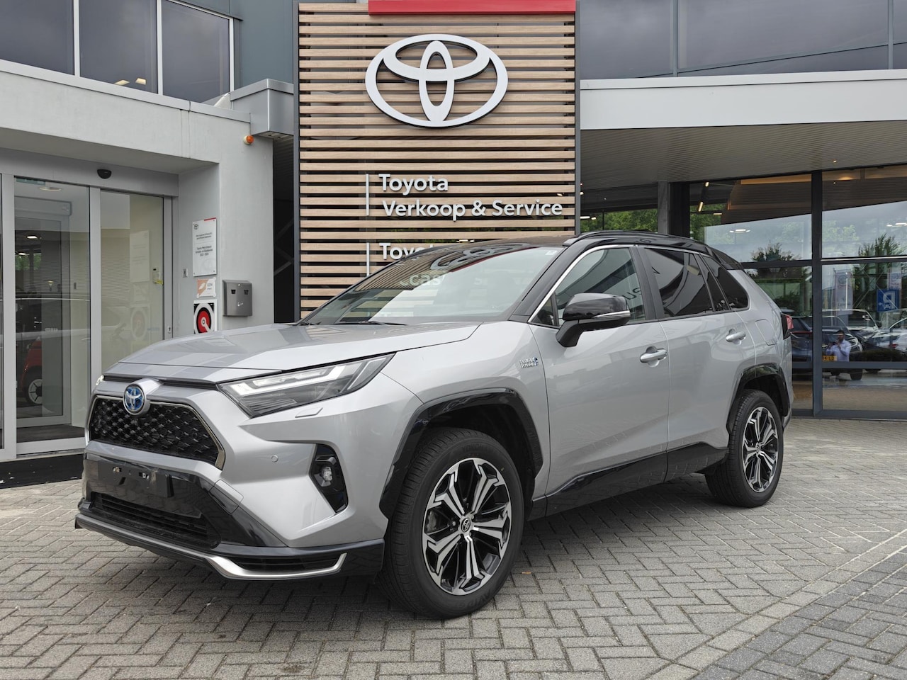 Toyota RAV4 - 2.5 Plug-in Hybrid AWD BI-TONE TREKHAAK 1500KG NAVI JBL-AUDIO 360VIEW ELEK-KLEP 19''INCH B - AutoWereld.nl