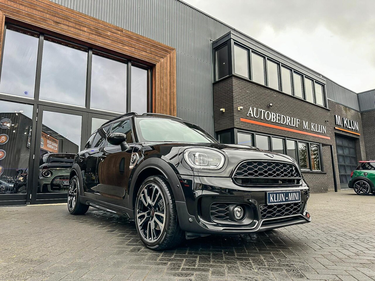MINI Countryman - Mini 2.0 Cooper S E ALL4 John Cooper Works 220pk/Pano/Camera/Btw - AutoWereld.nl