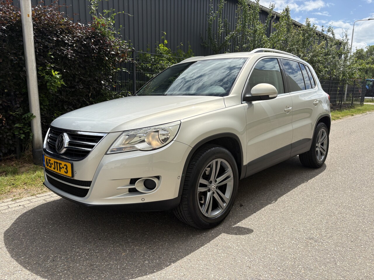 Volkswagen Tiguan - 1.4 TSI Sport&Style 4Motion / NAVI / CRUISE / 160dkm! NAP! - AutoWereld.nl