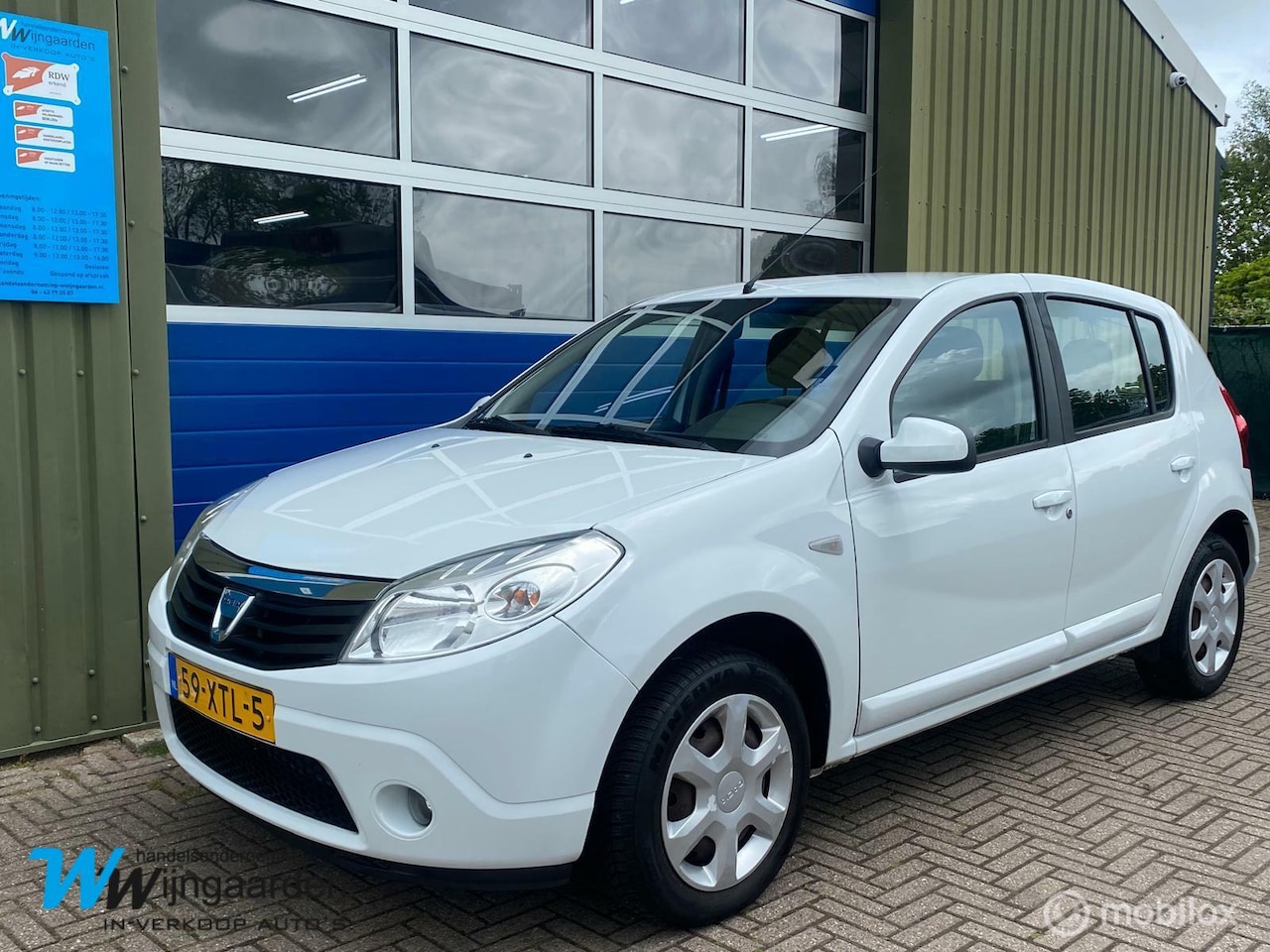 Dacia Sandero - 1.2 Lauréate LPG-G3 af fabriek|1Eigenaar|Airco - AutoWereld.nl