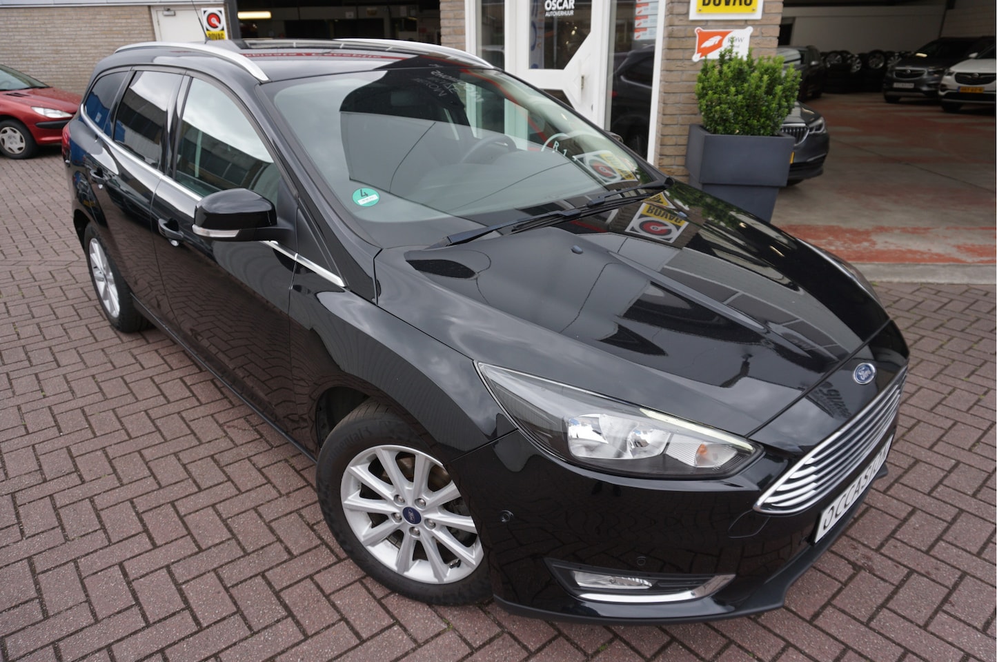 Ford Focus Wagon - 1.0I EcoBoost Titanium Edition - AutoWereld.nl
