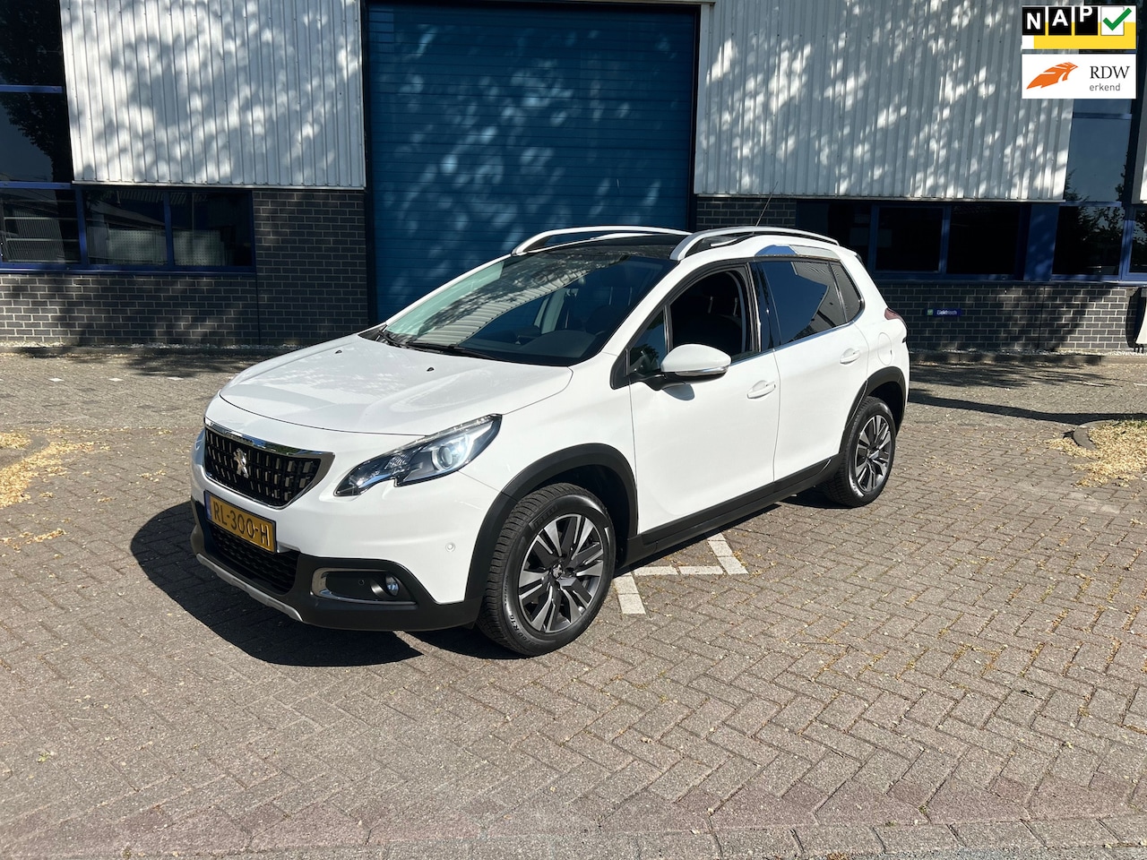 Peugeot 2008 - 1.2 PureTech *Panorama dak* - AutoWereld.nl