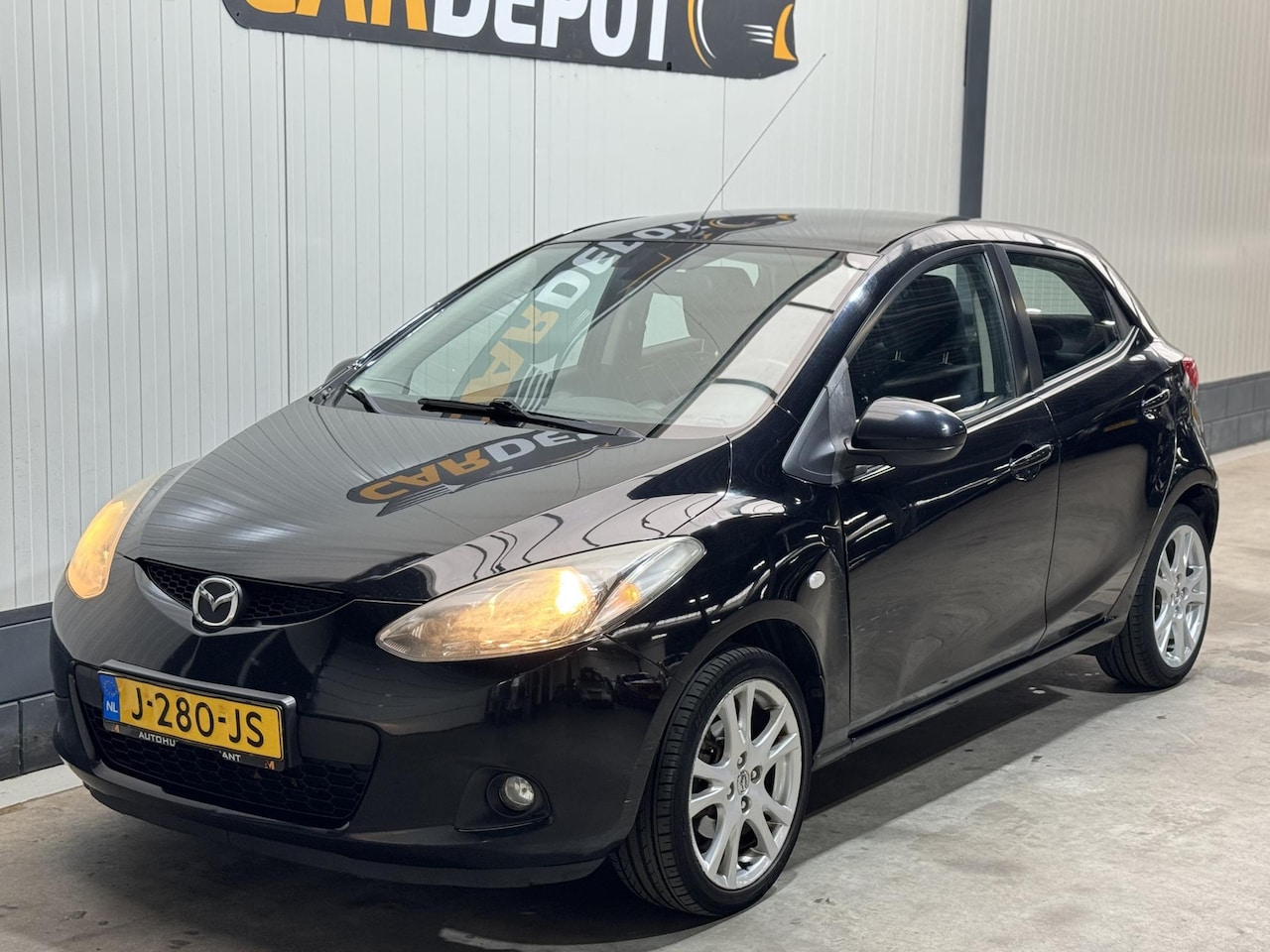 Mazda 2 - 1.3hp S-VT Touring 1.3hp S-VT Touring - AutoWereld.nl