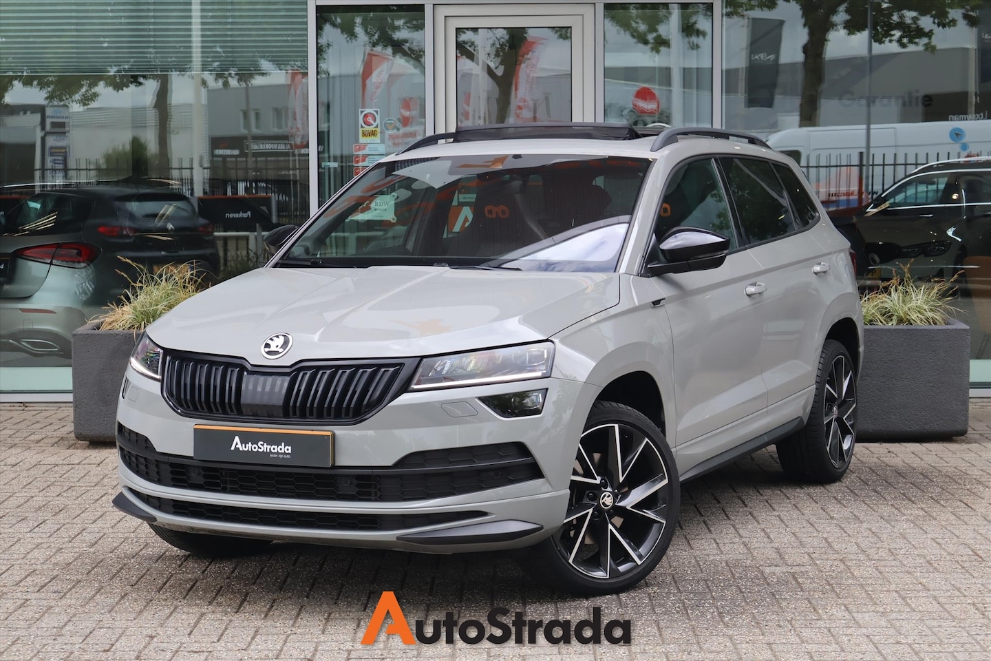 Skoda Karoq - 1.5 TSI ACT SportLine 150pk I Pano I Navi I Camera I Leder I Stoelverwarming I Virtual - AutoWereld.nl